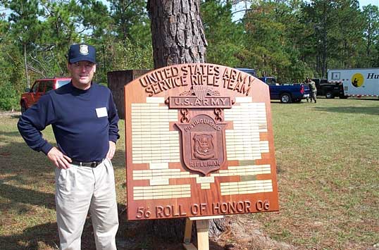 Ray Carter with the Service Rifle plaque.