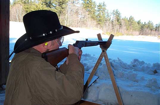 Shooting offhand with the lever action rifle.
