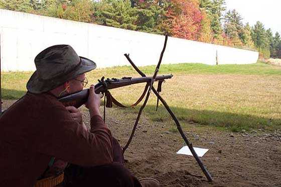 Shooting an original Springfield Trapdoor 1873 Rifle in .45-70 from cross-sticks at 200 yards.