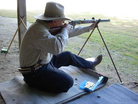 Bruce Mongeon shooting his Winchester 1873 off cross-sticks.