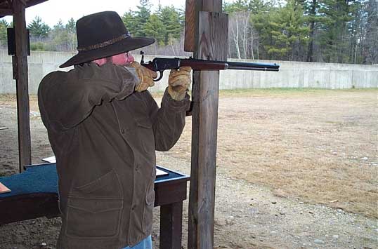 Callous Clyde shooting lever action rifle.