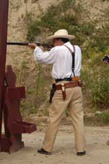 Shooting rifle while winning the Frontier Cartridge Duelist Championship at the 2005 SASS MA/CT/RI State Championship.