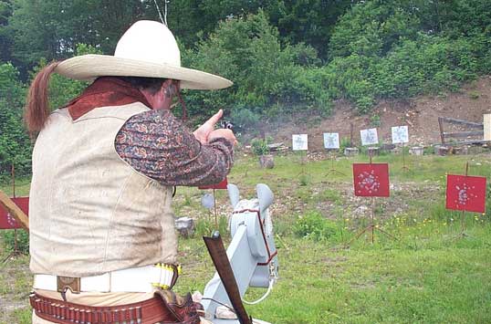 Capt. Morgan Rum shooting pistol at Flat Gap Jack Cowboy Shootout in June 2003.