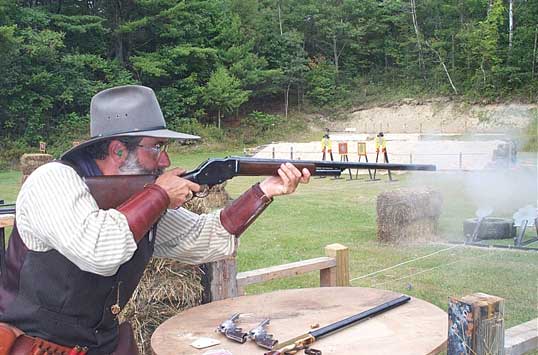 Shooting his Winchester 1887 with blackpowder shells at 2003 SASS Maine State Championships.
