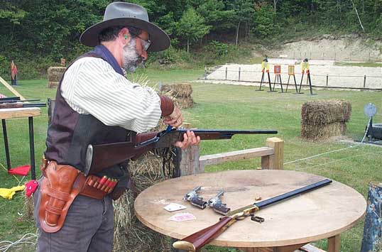 Loading his Winchester 1887 with blackpowder shells at 2003 SASS Maine State Championships.
