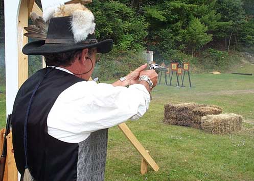 Shooting pistol at the 2003 SASS Maine State Championships.