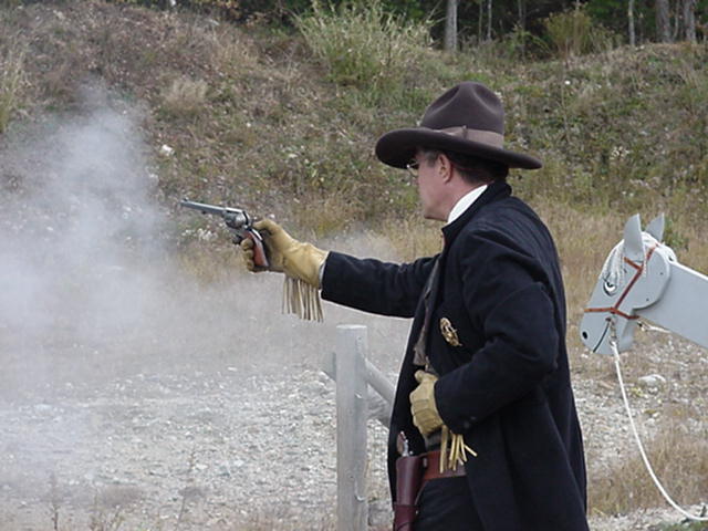 Cocking the pistol at 2003 Ghost Riders Revenge.