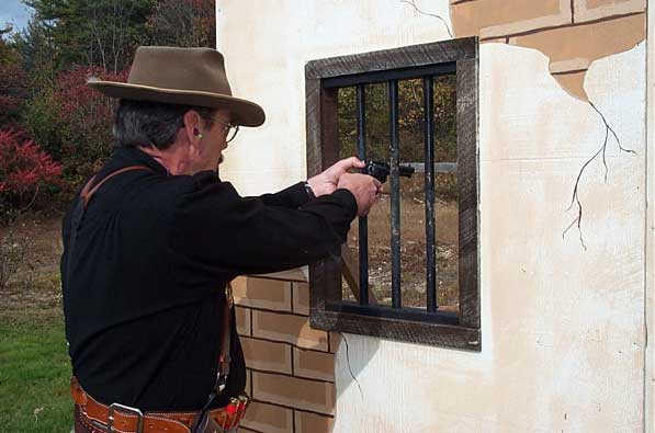 Doc Black shooting through the jail window.