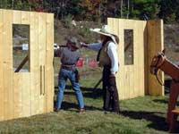 Miss Addy Tude shooting rifle with Capt. Morgan Rum timing.