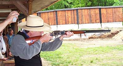 Aiming his 1873 Winchester.